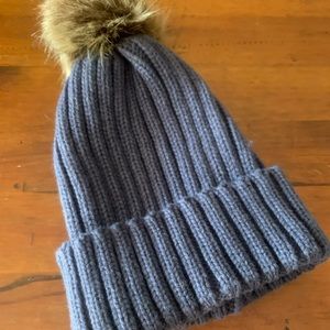 Blue beanie with fur Pom.